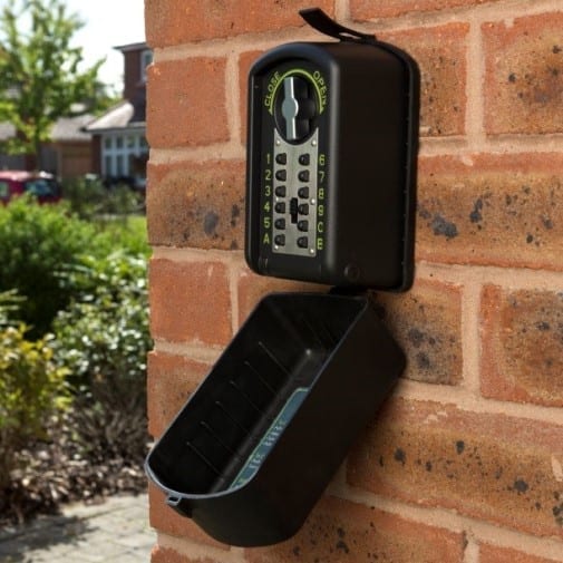 The Burton Keyguard Digital XL key safe, secured to a wall outside.
