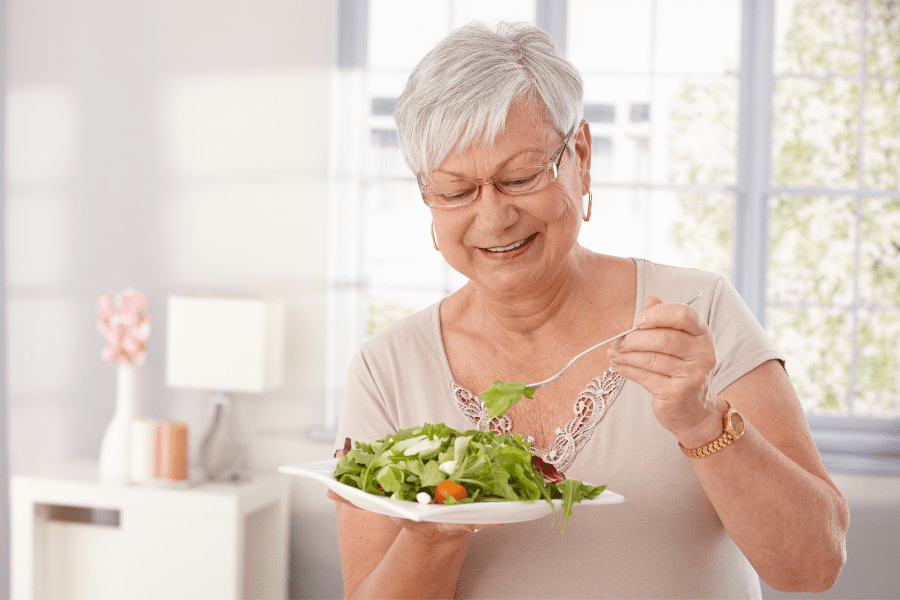 Old woman eating healthy diet