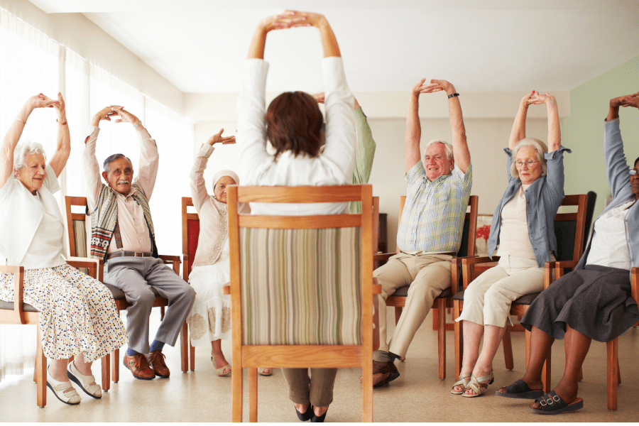 retired seniors on yoga class