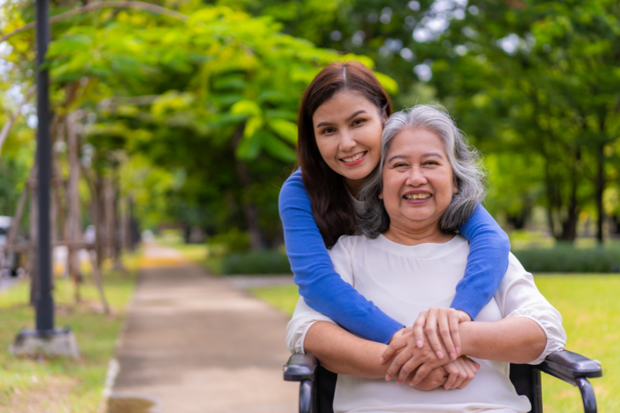 elderly woman with her daughter