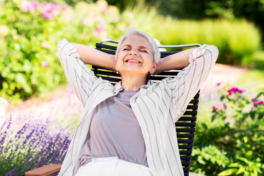 relaxed-elderly-woman-in-garden
