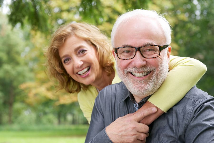 woman-embracing-elderly-loved-one-happy