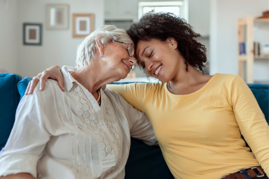 woman-showing-affection-to-elderly-loved-one